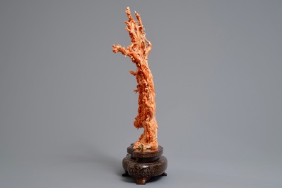 A Chinese carved red coral 'blossom tree' group on inlaid wooden stand, 19/20th C.